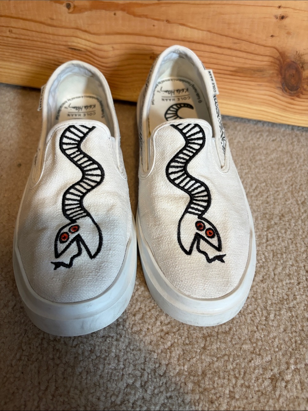 Cole Haan X Keith Haring Collab White Canvas Slip-On Sneakers with Black Graphic